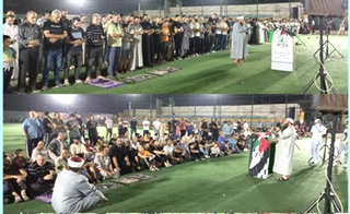 إقامة صلاة العشاء وصلاة الغائب للشهداء في نهر البارد