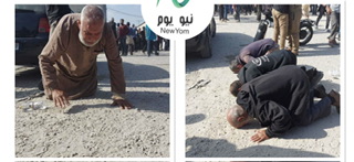 عمال غزيَون يسجدون بعد وصولهم إلى غزة عقب اعتقالهم منذ 7 تشرين الأول